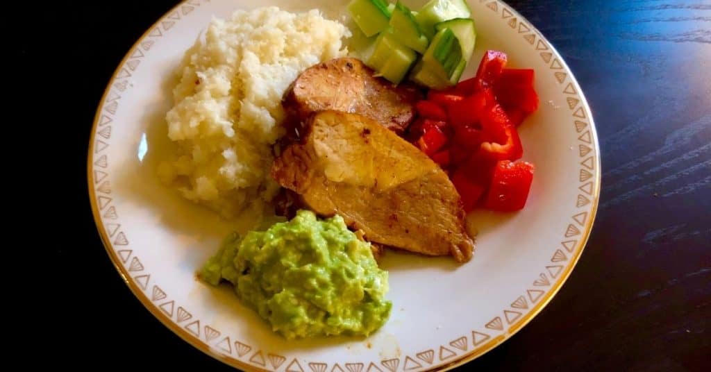 plate with mashed cauliflower potato keto
