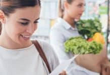 lady at store with clean food list